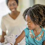 Girl getting flu shot