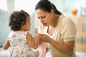 Mom looking at injured daughter