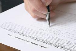 person filling out organ donation form