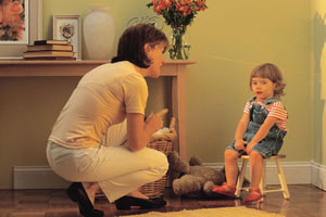 Mother disciplining toddler