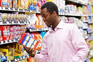 Dad looking at nutrition labels